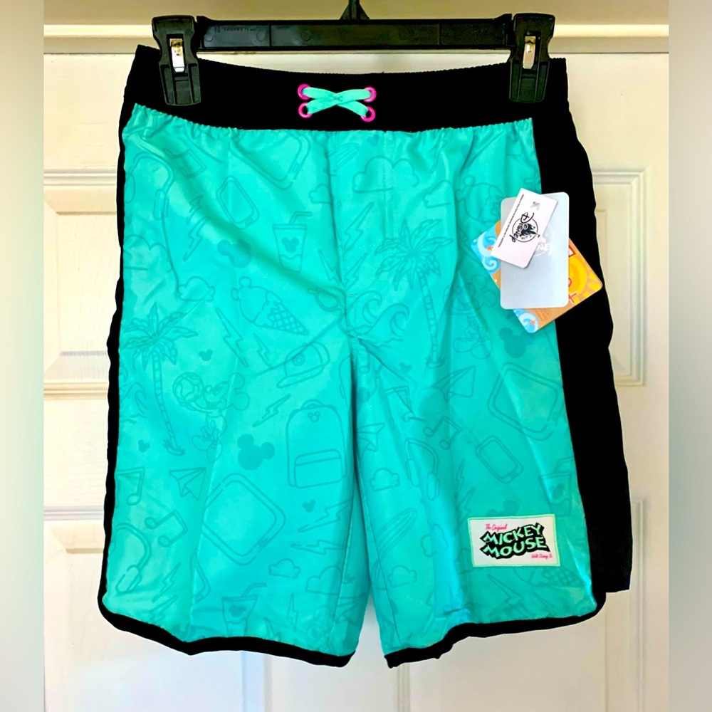 SOLD**New Disney Mickey Mouse Teal and Black Swim Shorts. Size 9-10